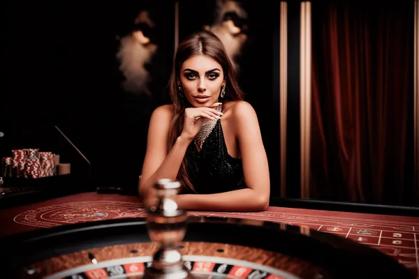 A laptop glowing with a bright login prompt in a minimalistic setup, symbolizing the protected access system at 2G777.